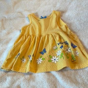 Dress, 4, yellow with white flowers and blue butterflies.